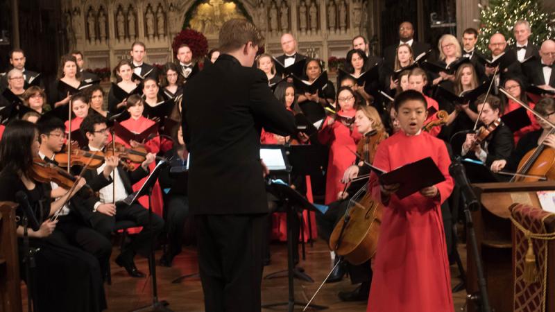 Stephen Sands directs choir for holiday concert
