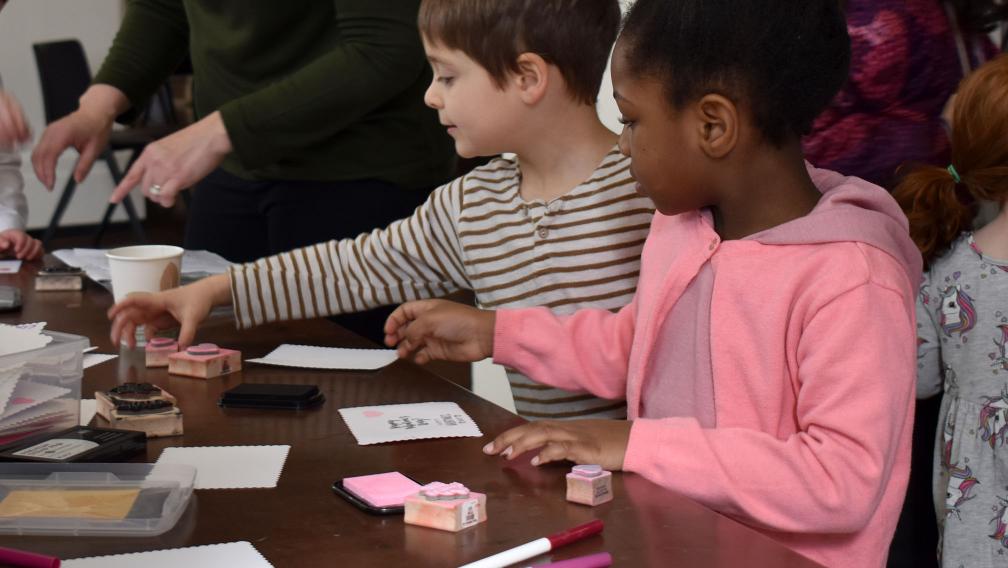 Children make handmade Valentine cards in St. Paul's Chapel during Whole Community Learning in early 2020