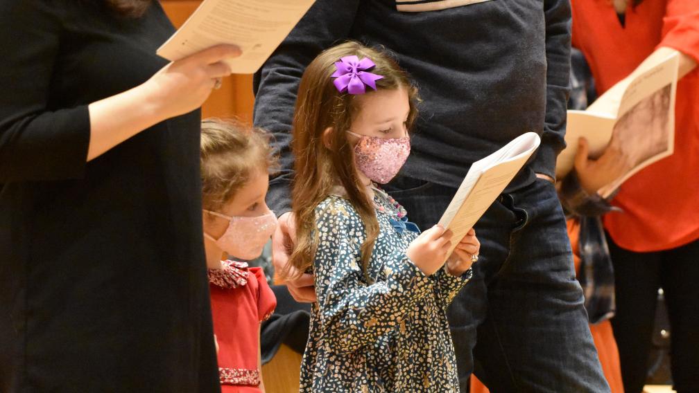 Children worshipping in Parish Hall