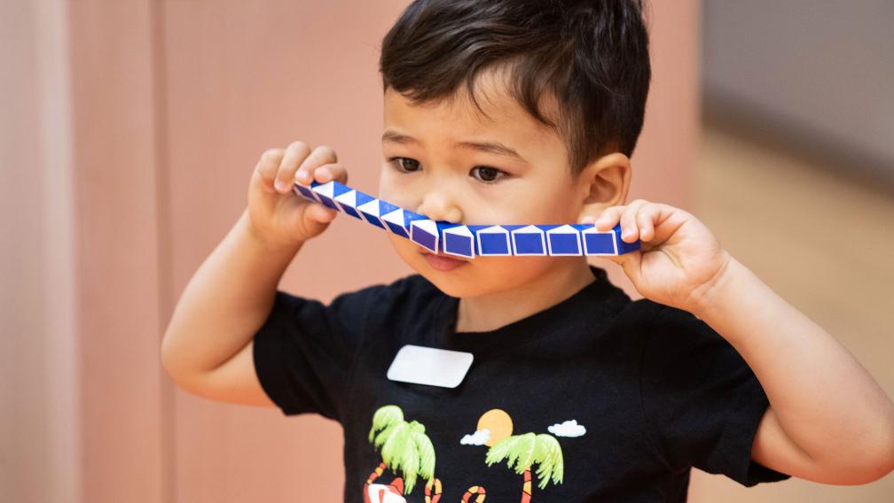 A child plays during Children's Time at Trinity Commons