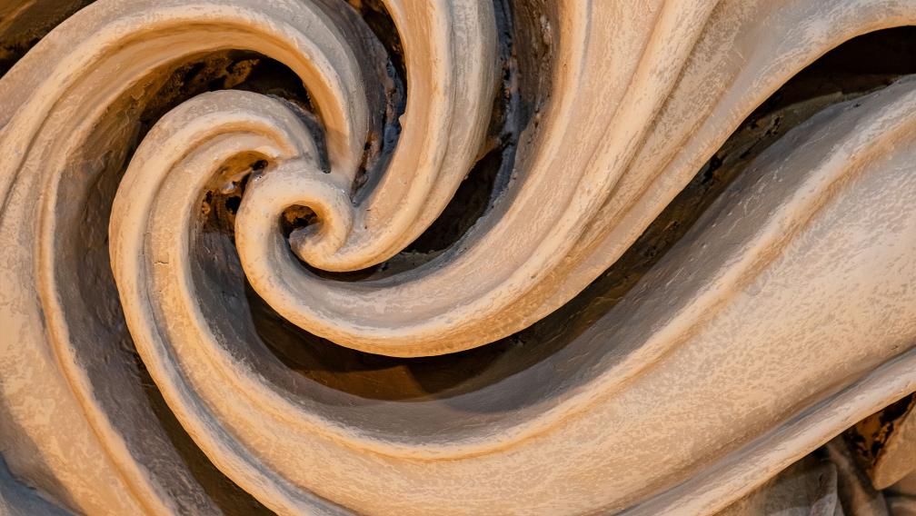 Close up photo of swirled plaster work in Trinity Church