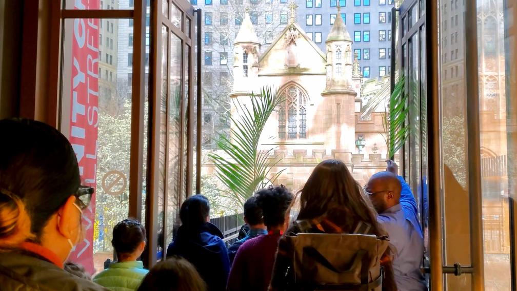 Trinity parishioners and families walk on pilgrimage on Palm Sunday.