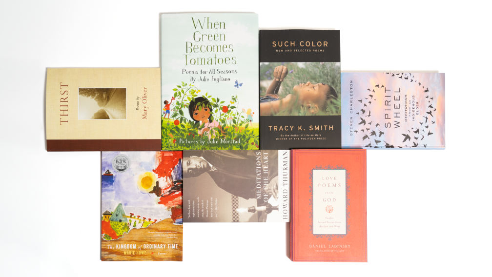 A flat-lay photograph of seven poetry books