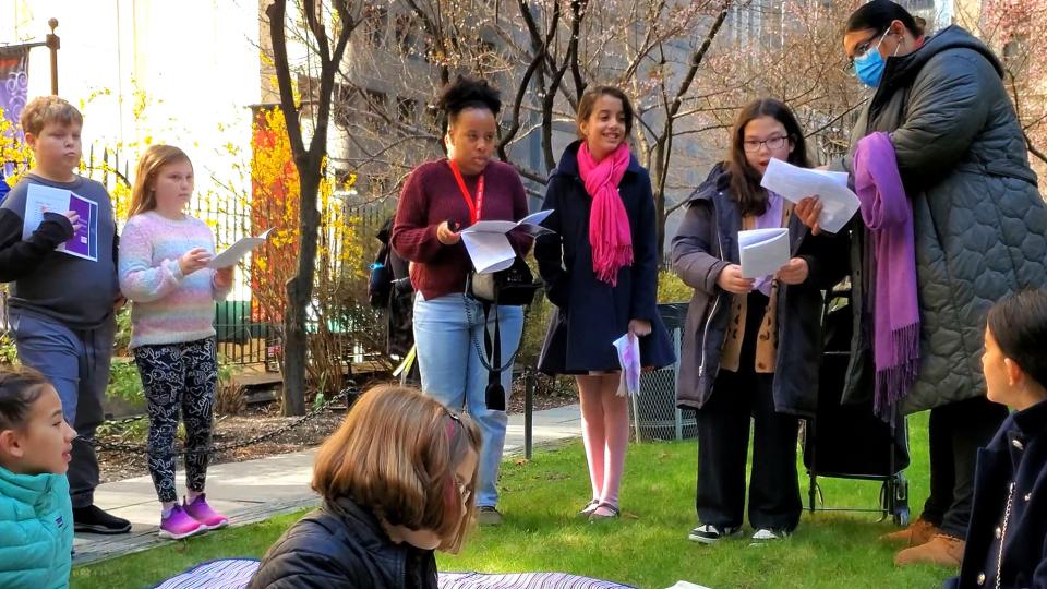 Trinity parishioners and families act out the Garden of Gethsemene on Palm Sunday.