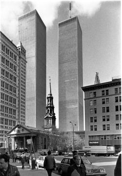 Black and White photo of St. Paul's Chapel with the World Trade Center towers