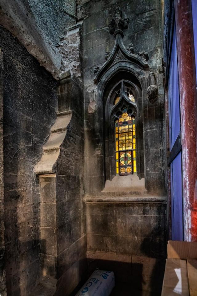 A stained-glass window on south facade of Trinity uncovered in 2018