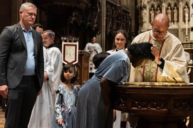 The Rev. Phil Jackson baptized Cinthi Pillai on November 6, 2022