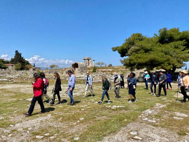 Group of people walking across field