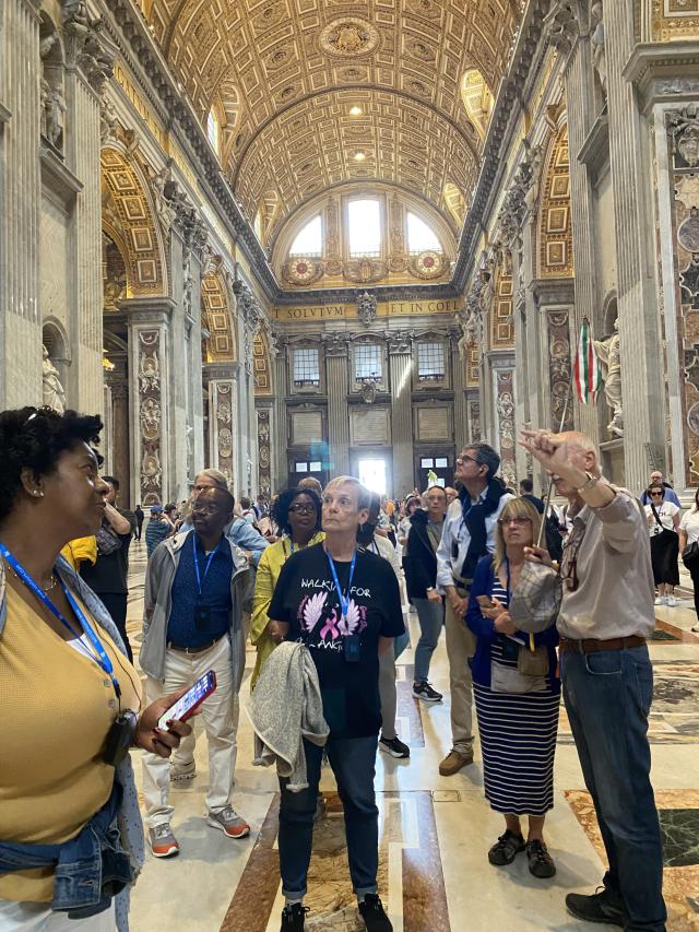 Group stands in church