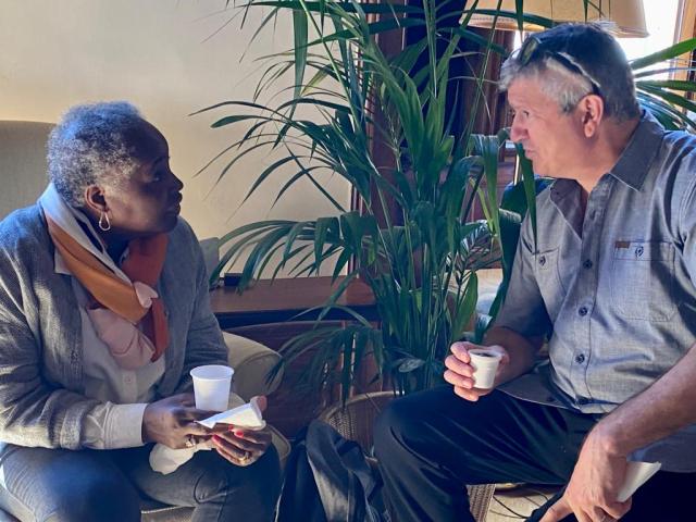 A man and woman in conversation