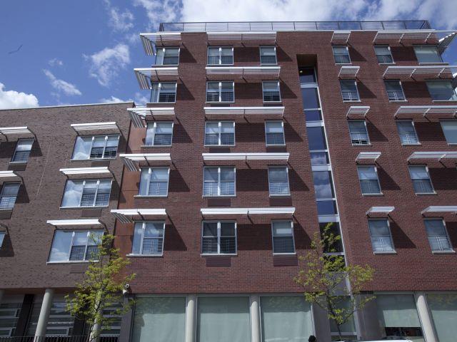 An exterior shot of an apartment building.