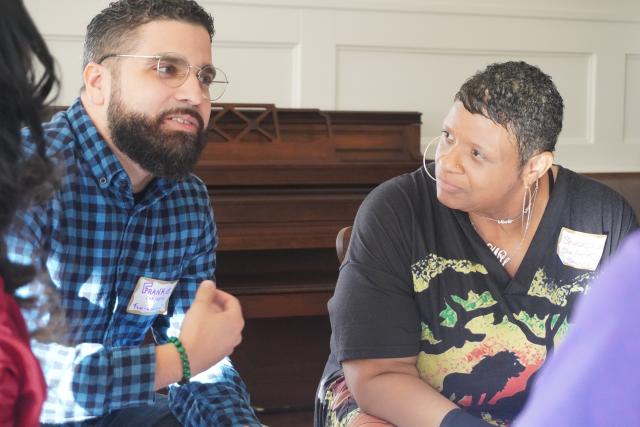 WKTK retreat participants sit in deep conversation at the Trinity Retreat Center.