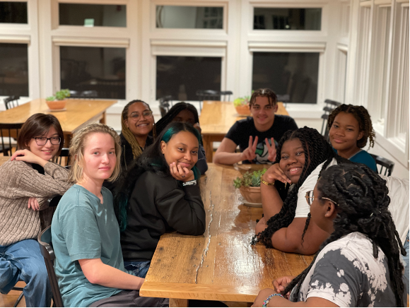 Trinity Youth members sit together at the Retreat Center. 