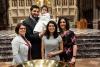 A family poses in Trinity Church on All Saints Sunday 2021