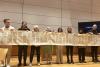 Into the Word participants hold up a Torah Scroll during Rabbi Darren Levine's presentation, February 1, 2024