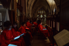 Members of Trinity Youth Chorus are seated in the choir loft before the performance.