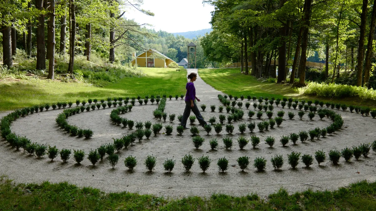 A woman walks the labyrinth
