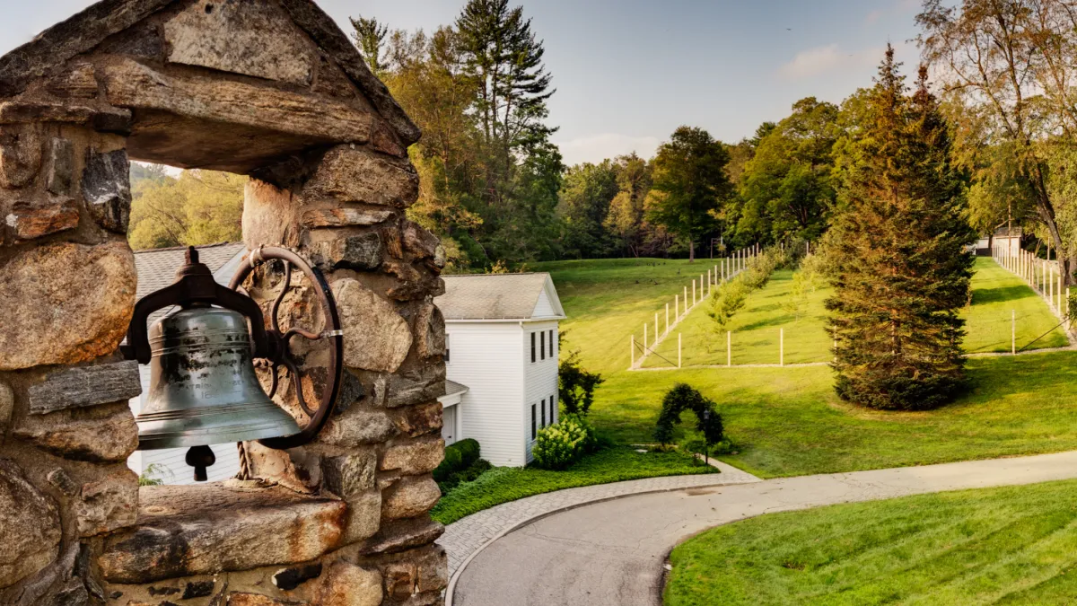 Panoramic view of the bell tower of the Retreat Center chapel and the grounds