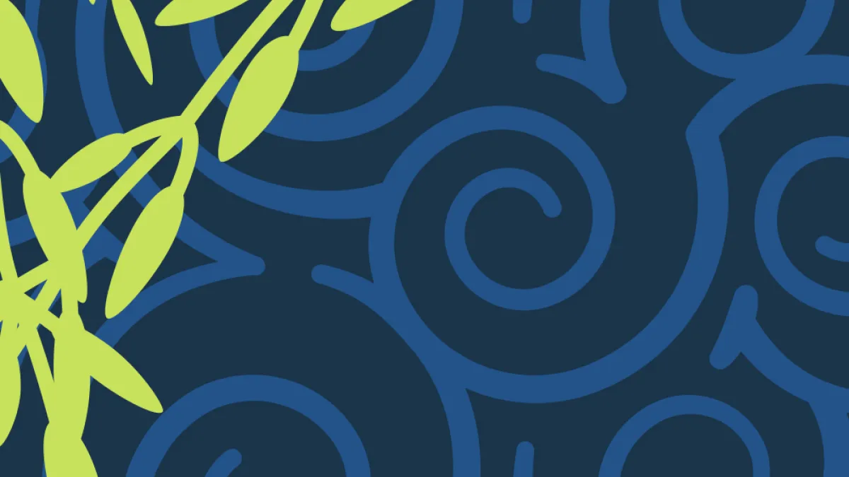 Green leaves over blue waves