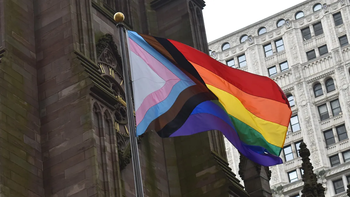Pride Progress Flag flies outside Trinity Church