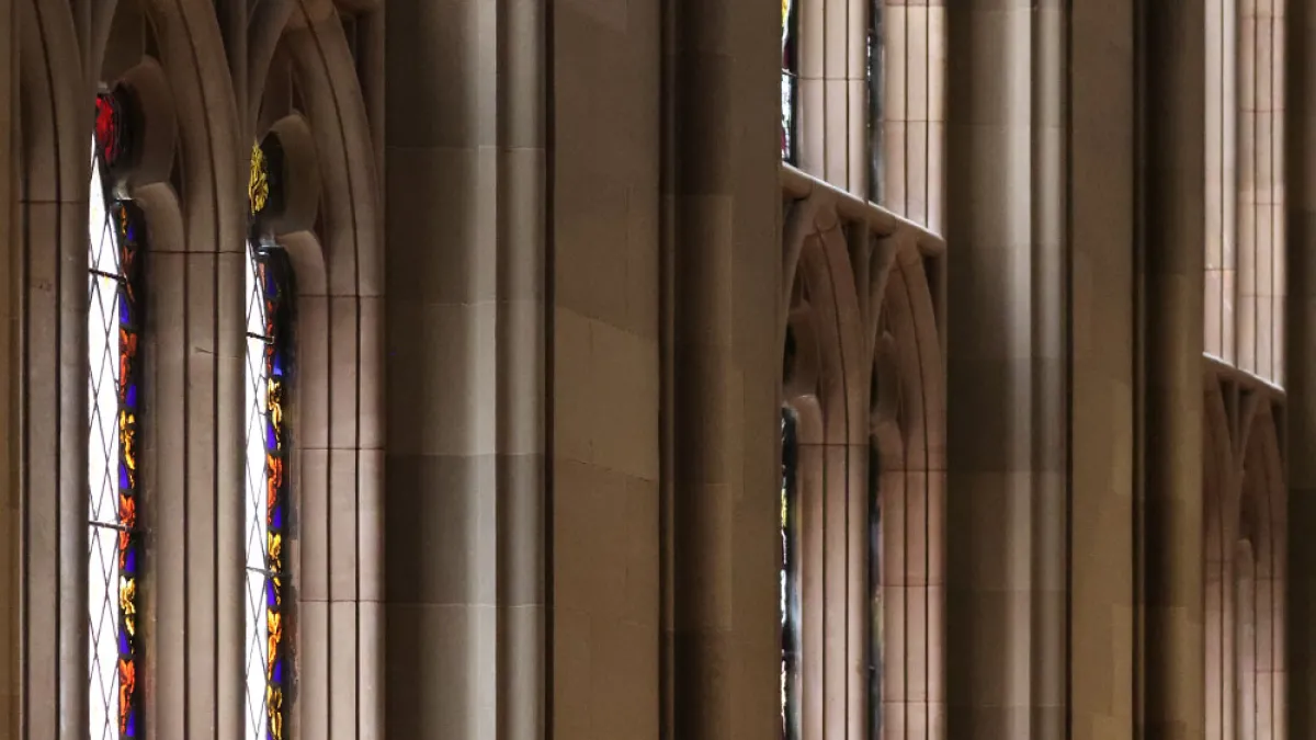 Lighting shining through stained-glass windows in Trinity Church