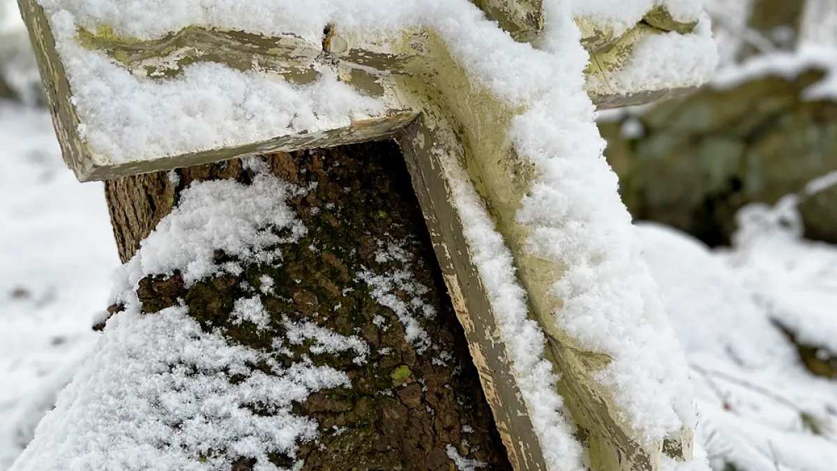Cross in the snow at Trinity Retreat center