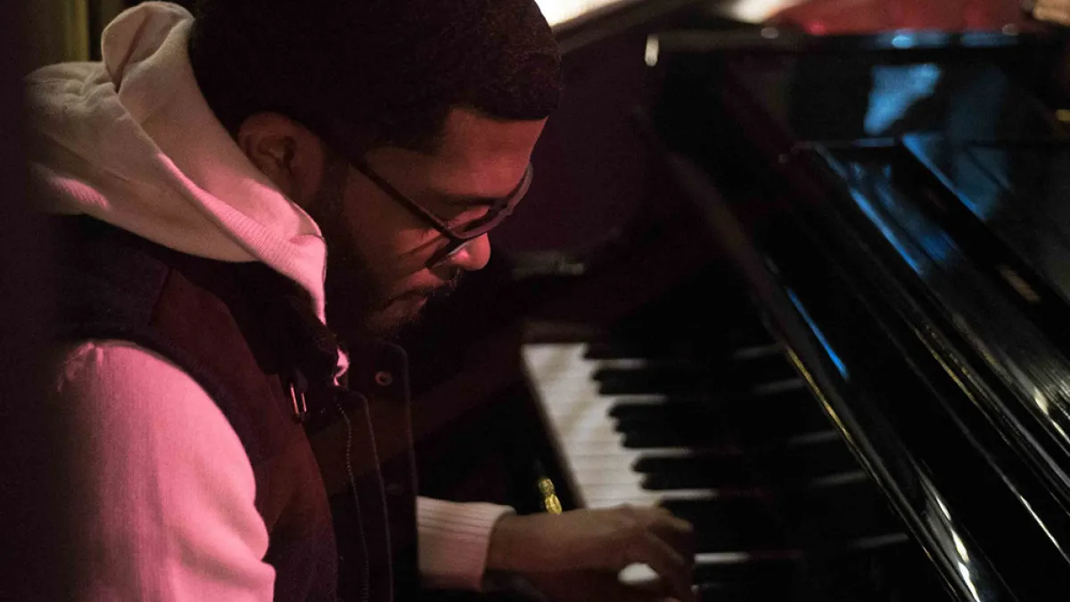 Michael King plays the piano