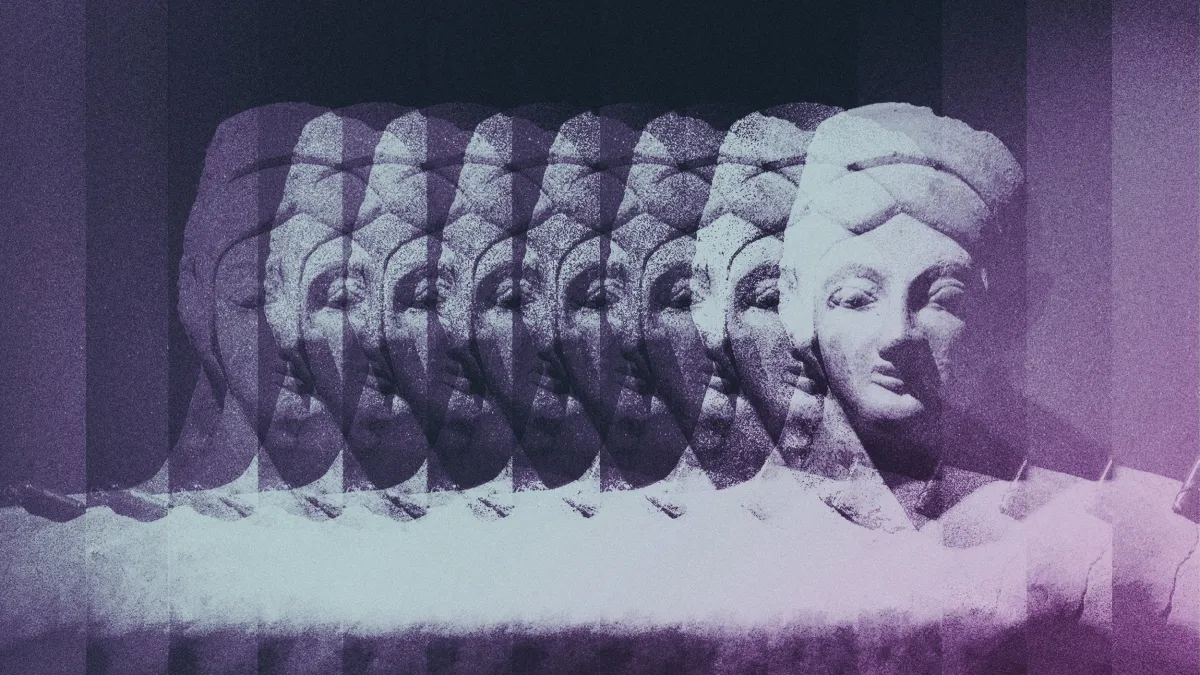 Purple image of a statue repeated