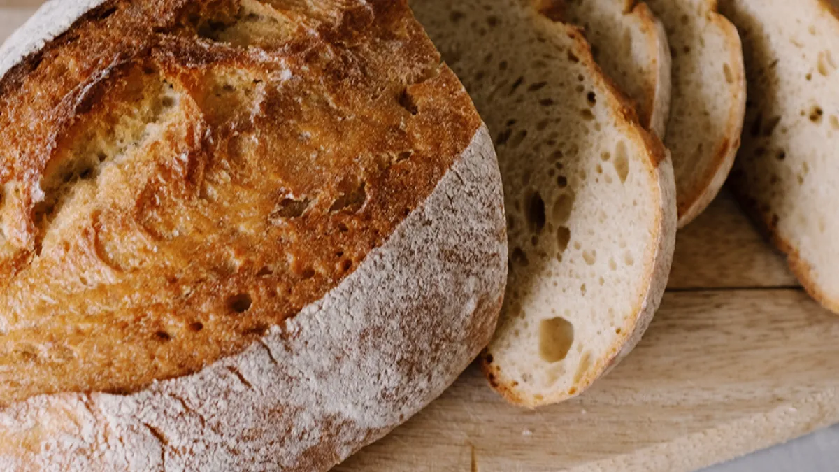 A sliced loaf of bread on a plate