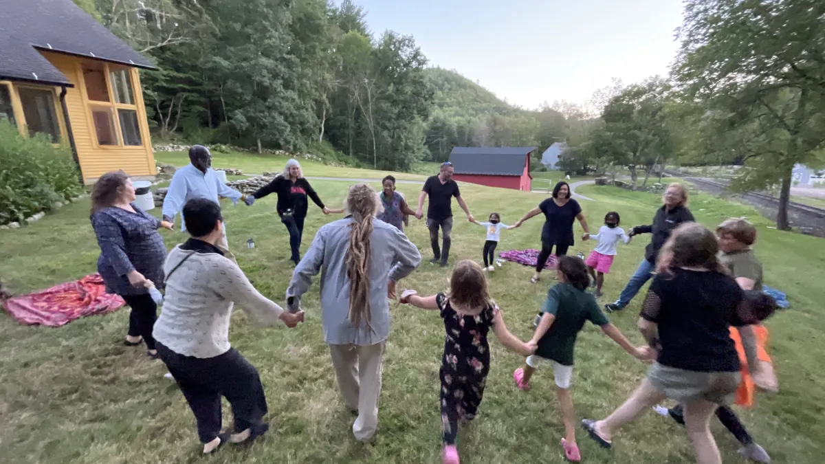 Group of people on the grounds of TRC