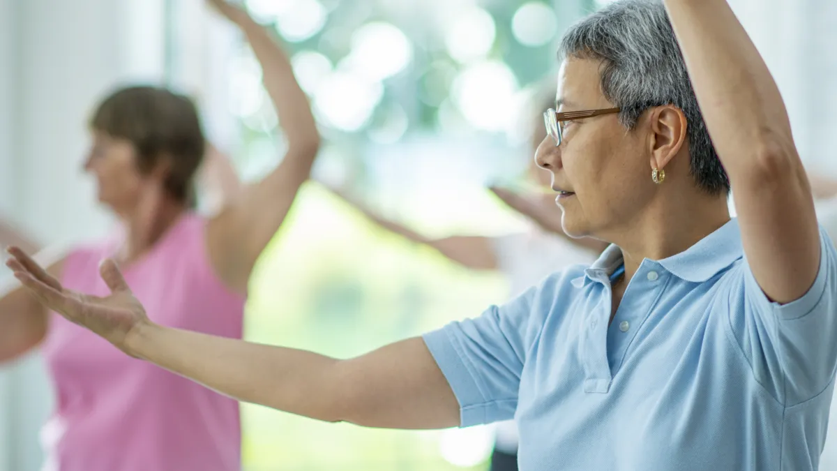 Seniors doing tai chi.