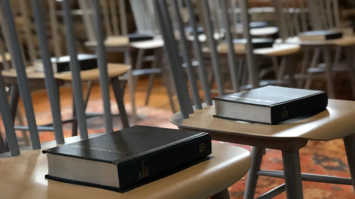 Chairs with bibles on them