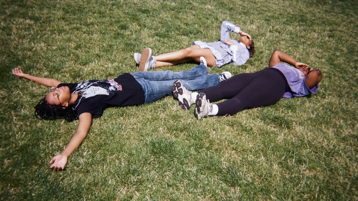 Youth lying on the grass