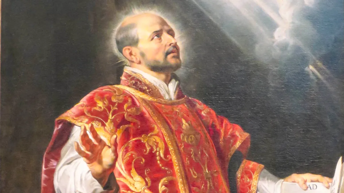 A priest in a red robe