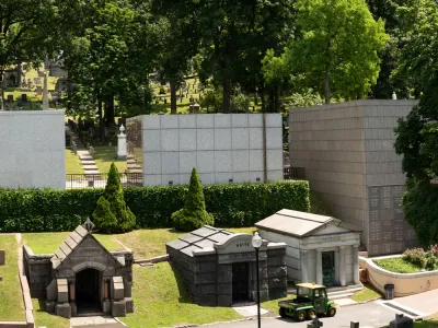 View of contemporary mausoleum structures and historic headstones