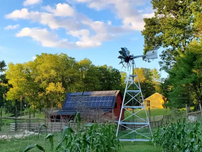 Corn field, Barn with solar panels and a windmill