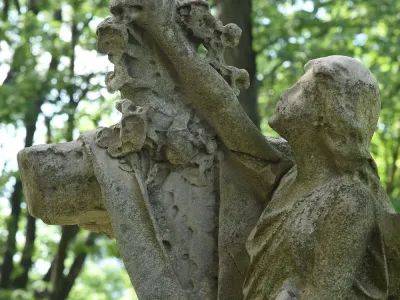 Detail of an angel holding a cross