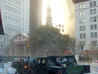 Jeeps and soldiers standing on Broadway in front of St. Paul's Chapel on September 11, 2001