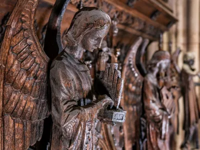 Angels carved out of wood lined up in Trinity Church