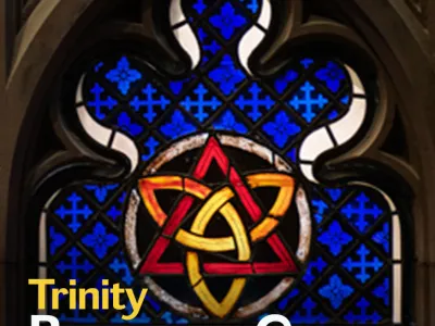 A stained glass window featuring a gold trinity knot inside a red triangle over a blue backdrop