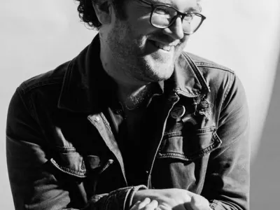 Black and white photograph of Pádraig Ó Tuama, taken by Trevor Brady