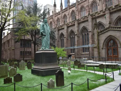 A statue of John Watts Jr. in the south churchyard of Trinity Church Wall Street