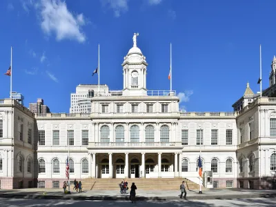 New York City Hall shot from the front on a sunny day.