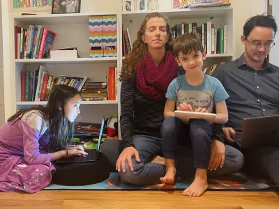 Retreat leader meditates while with her family