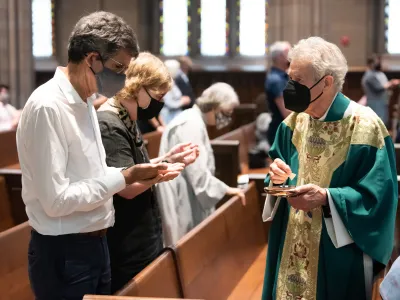 The Rev. Canon James Callaway presenting Holy Communion on Sunday, June 27, 2021.