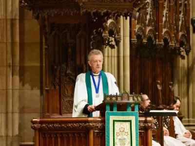 Father Callaway in the pulpit