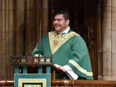 Father Matt in the pulpit