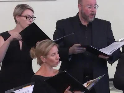 Members of The Choir of Trinity Wall Street sing in St. Paul's Chapel