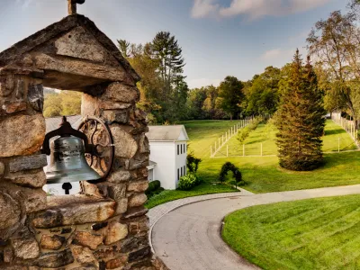 Panoramic view of the bell tower of the Retreat Center chapel and the grounds