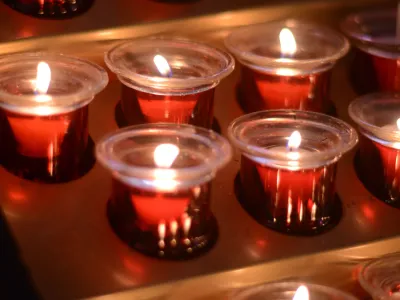 Lit prayer candles in St. Paul's Chapel